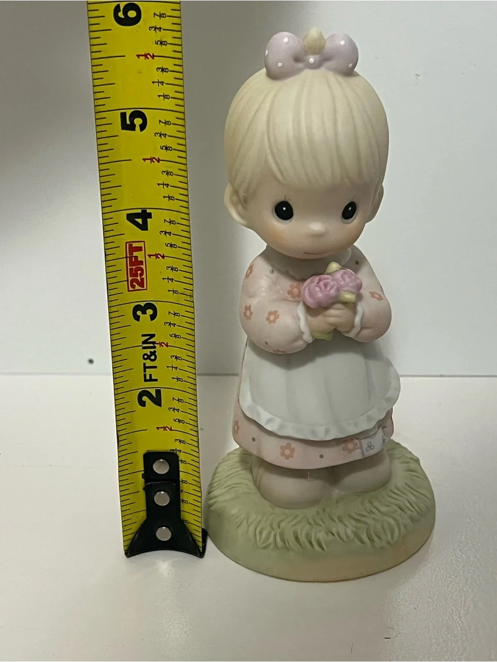 Vintage Precious Moments figurine titled “Mommy I Love You” from 1987